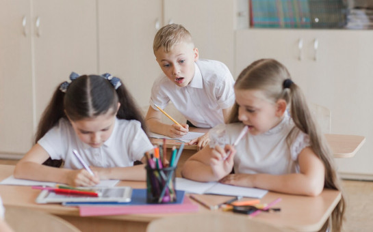 boy-peeping-into-notebooks-girls_23-2147848621.jpg
